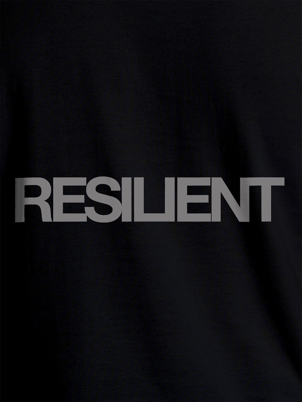 Close up of 'Resilient' design on Men's Black Round Neck T-shirt, highlighting intricate details and vibrant print.