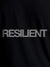 Close up of 'Resilient' design on Men's Black Round Neck T-shirt, highlighting intricate details and vibrant print.
