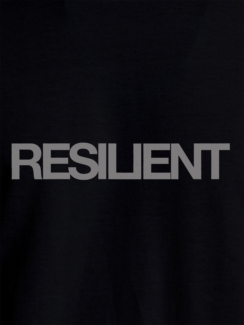Close up of 'Resilient' design on Women's Black Round Neck T-shirt, highlighting intricate details and vibrant print.