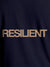 Close up of 'Resilient' design on Men's Navy Blue Round Neck T-shirt, highlighting intricate details and vibrant print.
