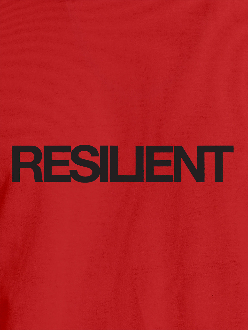 Close up of 'Resilient' design on Women's Red Round Neck T-shirt, highlighting intricate details and vibrant print.