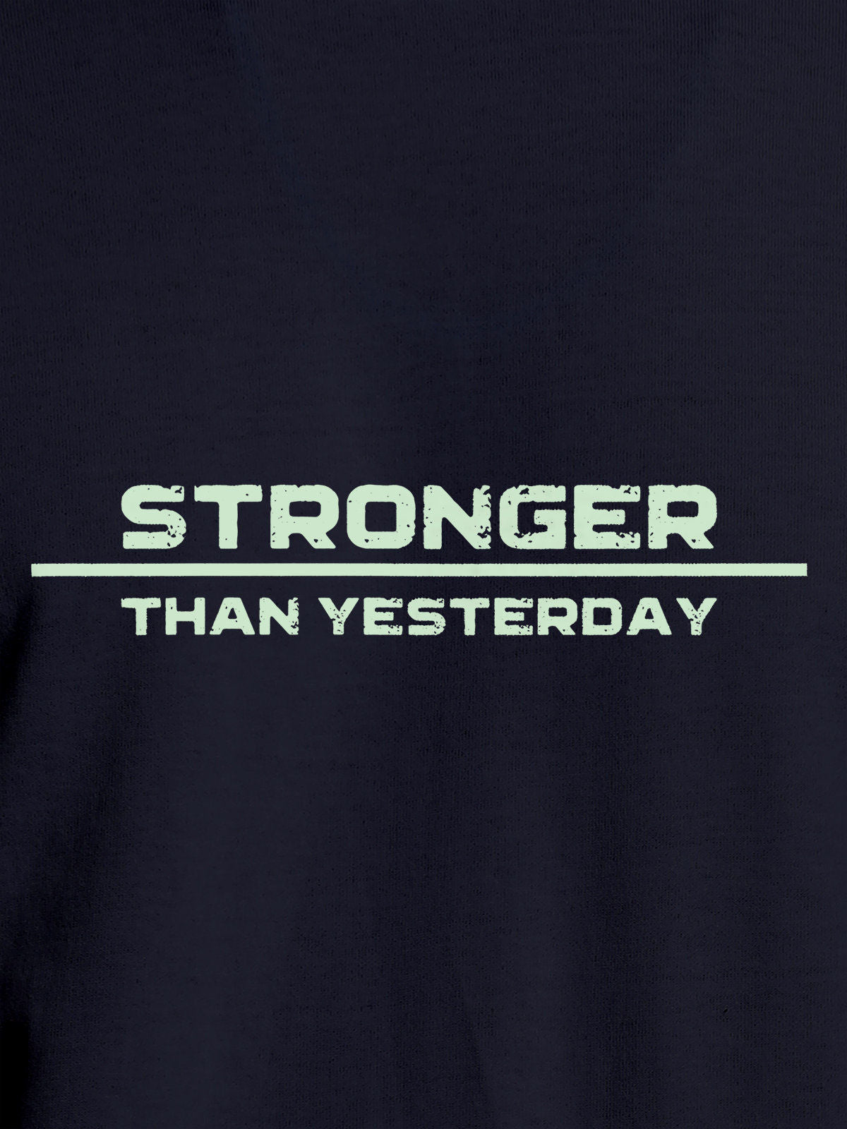 Close up of 'Stronger Than Yesterday' design on Women's Navy Blue Round Neck T-shirt, highlighting intricate details and vibrant print.