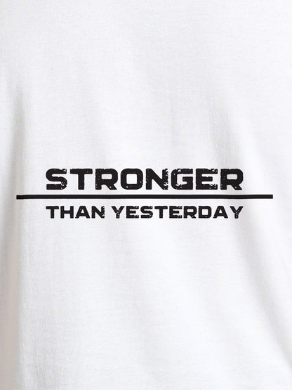Close up of 'Stronger Than Yesterday' design on Men's White Round Neck T-shirt, highlighting intricate details and vibrant print.