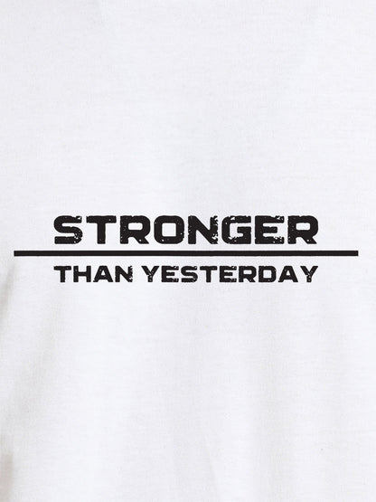 Close up of 'Stronger Than Yesterday' design on Women's White Round Neck T-shirt, highlighting intricate details and vibrant print.
