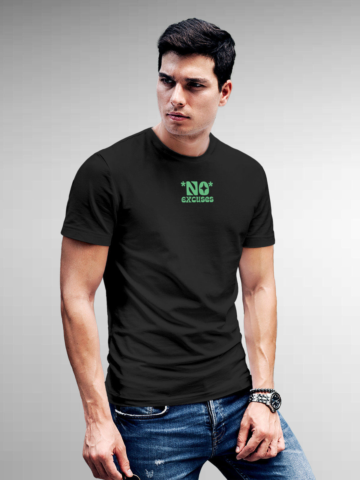 Model wearing Men's Dark Grey Round Neck T-shirt with 'No Excuses' design, offering effortless style and premium comfort