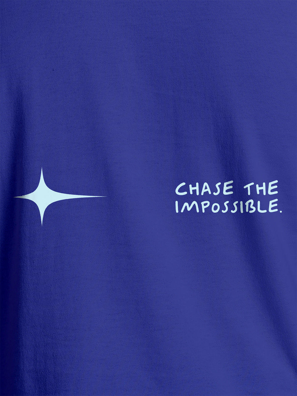 Close up of 'Chase The Impossible' design on Men's Blue Round Neck T-shirt, highlighting intricate details and vibrant print.