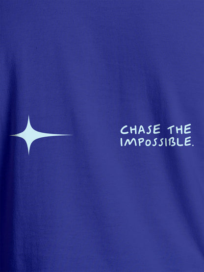 Close up of 'Chase The Impossible' design on Men's Blue Round Neck T-shirt, highlighting intricate details and vibrant print.