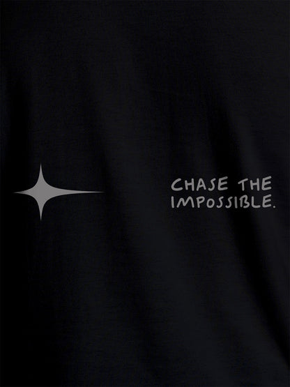 Close up of 'Chase The Impossible' design on Men's Black Round Neck T-shirt, highlighting intricate details and vibrant print.