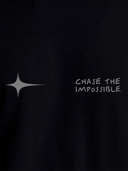 Close up of 'Chase The Impossible' design on Women's Black Round Neck T-shirt, highlighting intricate details and vibrant print.