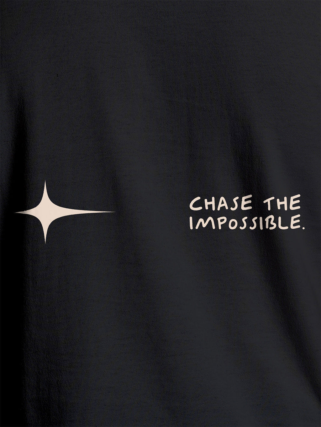 Close up of 'Chase The Impossible' design on Men's Dark Grey Round Neck T-shirt, highlighting intricate details and vibrant print.