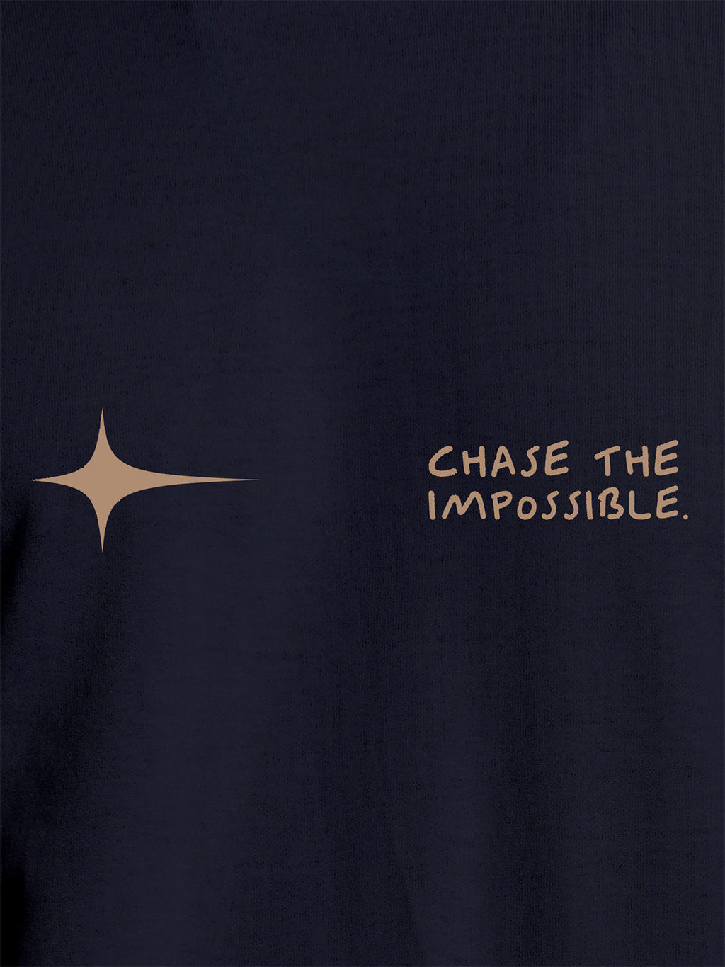 Close up of 'Chase The Impossible' design on Women's Navy Blue Round Neck T-shirt, highlighting intricate details and vibrant print.