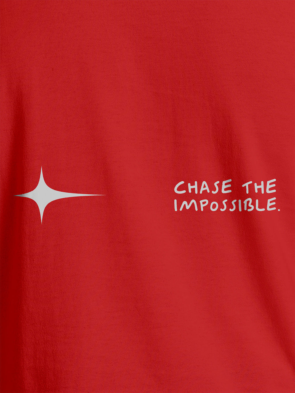 Close up of 'Chase The Impossible' design on Men's Red Round Neck T-shirt, highlighting intricate details and vibrant print.