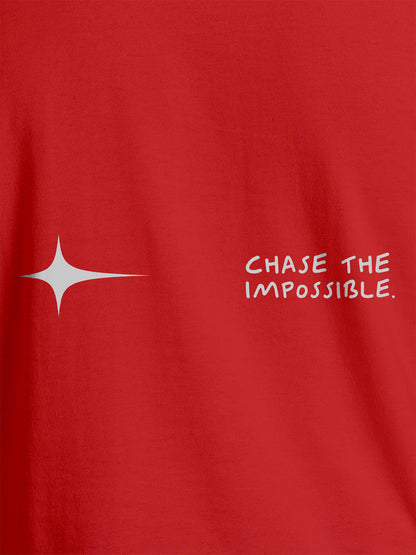 Close up of 'Chase The Impossible' design on Men's Red Round Neck T-shirt, highlighting intricate details and vibrant print.