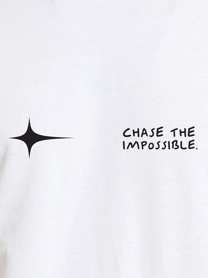 Close up of 'Chase The Impossible' design on Women's White Round Neck T-shirt, highlighting intricate details and vibrant print.