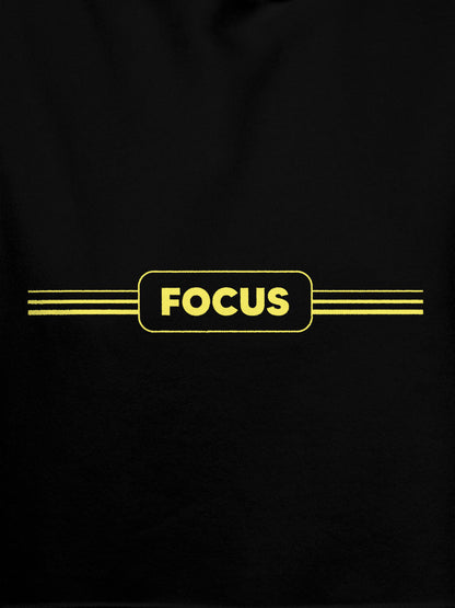 Close up of 'Focus' design on Women's Black Hoodie Sweatshirt, highlighting intricate details and vibrant print.