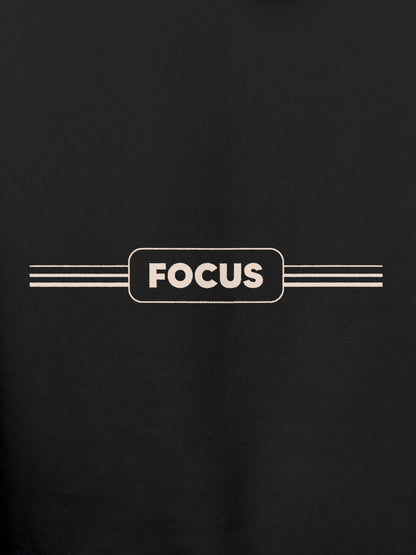 Close up of 'Focus' design on Men's Dark Grey Hoodie Sweatshirt, highlighting intricate details and vibrant print.