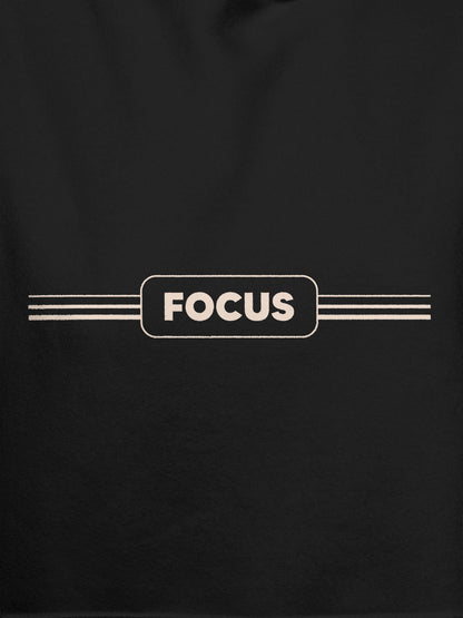 Close up of 'Focus' design on Women's Dark Grey Hoodie Sweatshirt, highlighting intricate details and vibrant print.