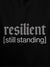 Close up of 'Resilient' design on Men's Black Hoodie Sweatshirt, highlighting intricate details and vibrant print.