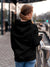 Back view of Fighterhero Women's Black Hoodie Sweatshirt, highlighting the modern look and clean finish