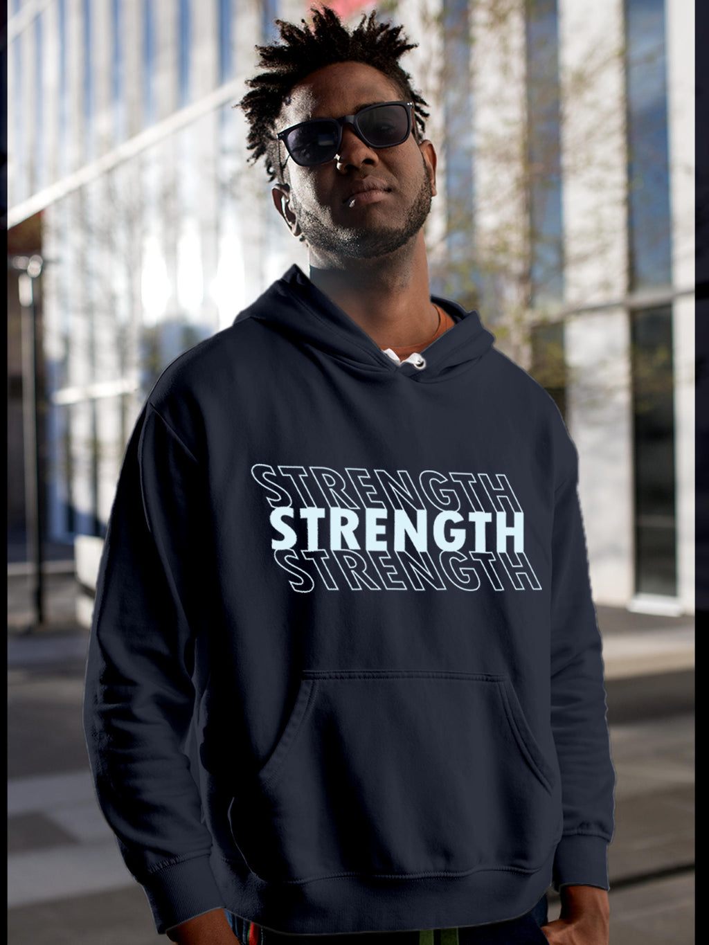 Model wearing Men's Navy Blue Hoodie Sweatshirt with 'Strength' design, offering effortless style and premium comfort