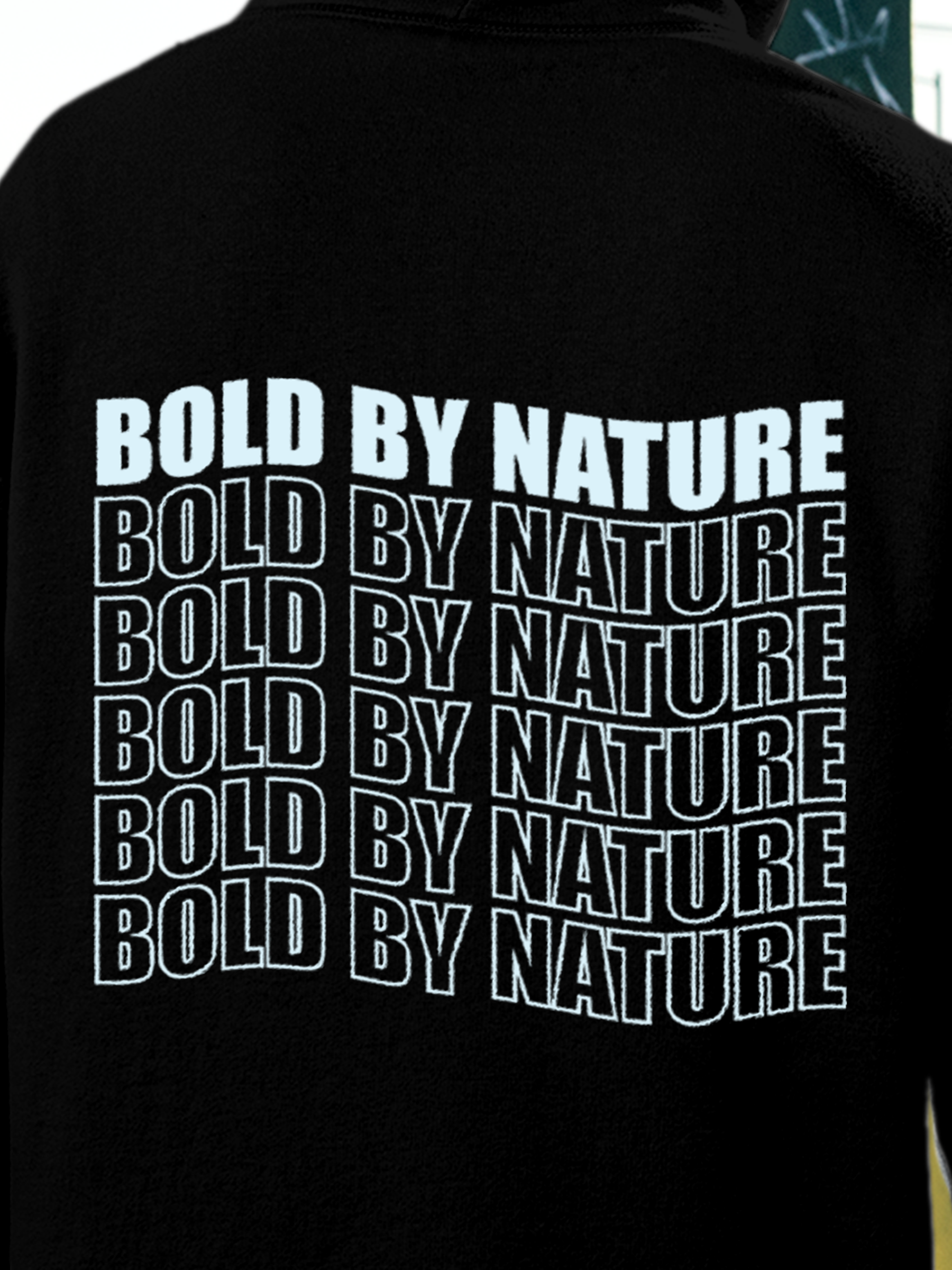 Close up of 'Bold By Nature' design on Men's Black Hoodie Sweatshirt, highlighting intricate details and vibrant print.