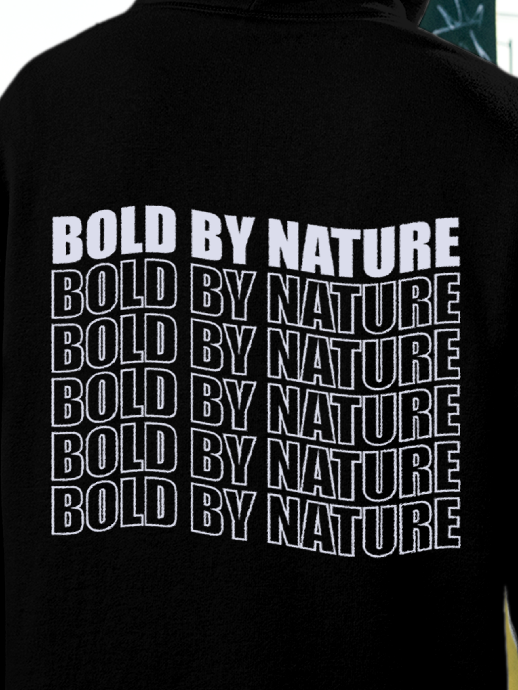 Close up of 'Bold By Nature' design on Men's Black Hoodie Sweatshirt, highlighting intricate details and vibrant print.