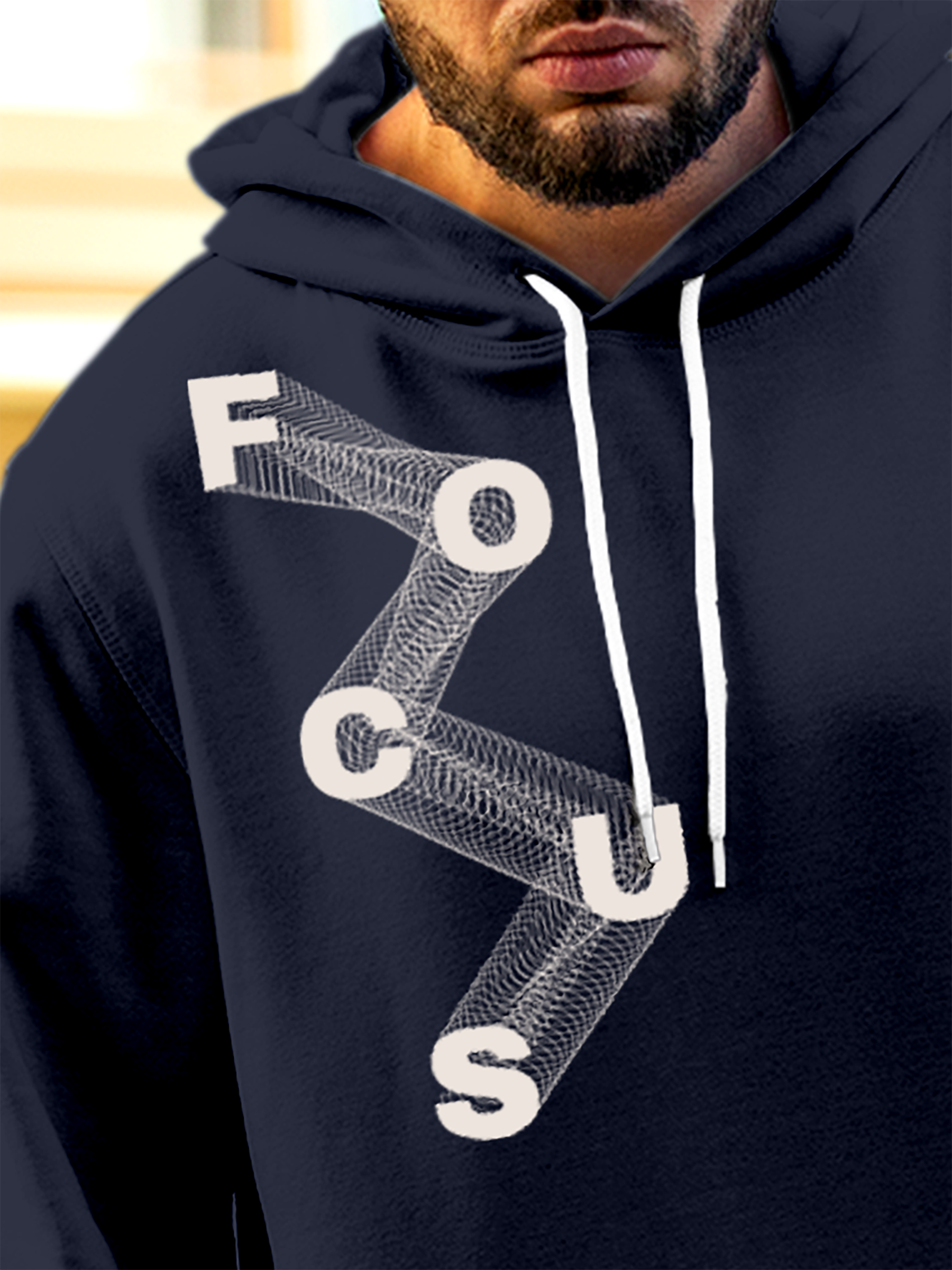 Close up of 'Focus' design on Men's Navy Blue Hoodie Sweatshirt, highlighting intricate details and vibrant print.