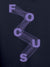 Close up of 'Focus' design on Men's Navy Blue Hoodie Sweatshirt, highlighting intricate details and vibrant print.