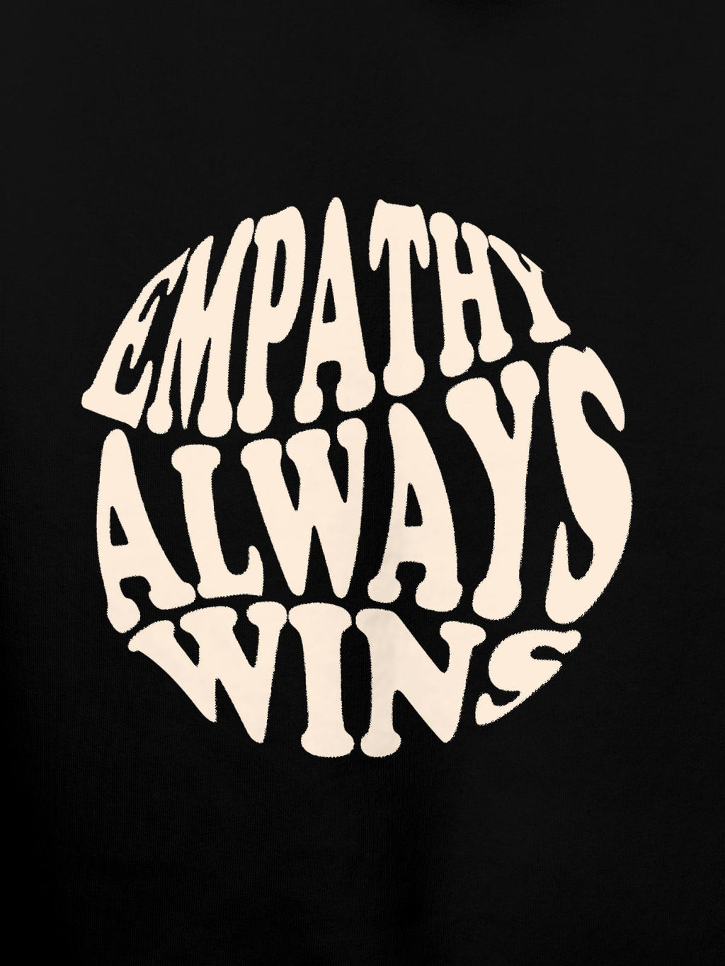 Close up of 'Empathy Always Wins' design on Women's Black Hoodie Sweatshirt, highlighting intricate details and vibrant print.