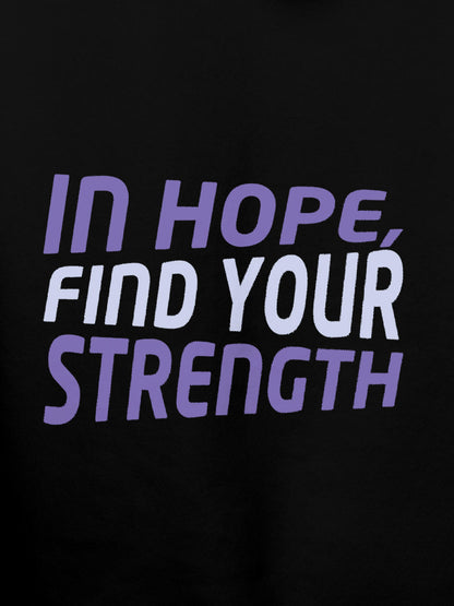 Close up of 'In Hope, Find Your Strength' design on Men's Black Hoodie Sweatshirt, highlighting intricate details and vibrant print.
