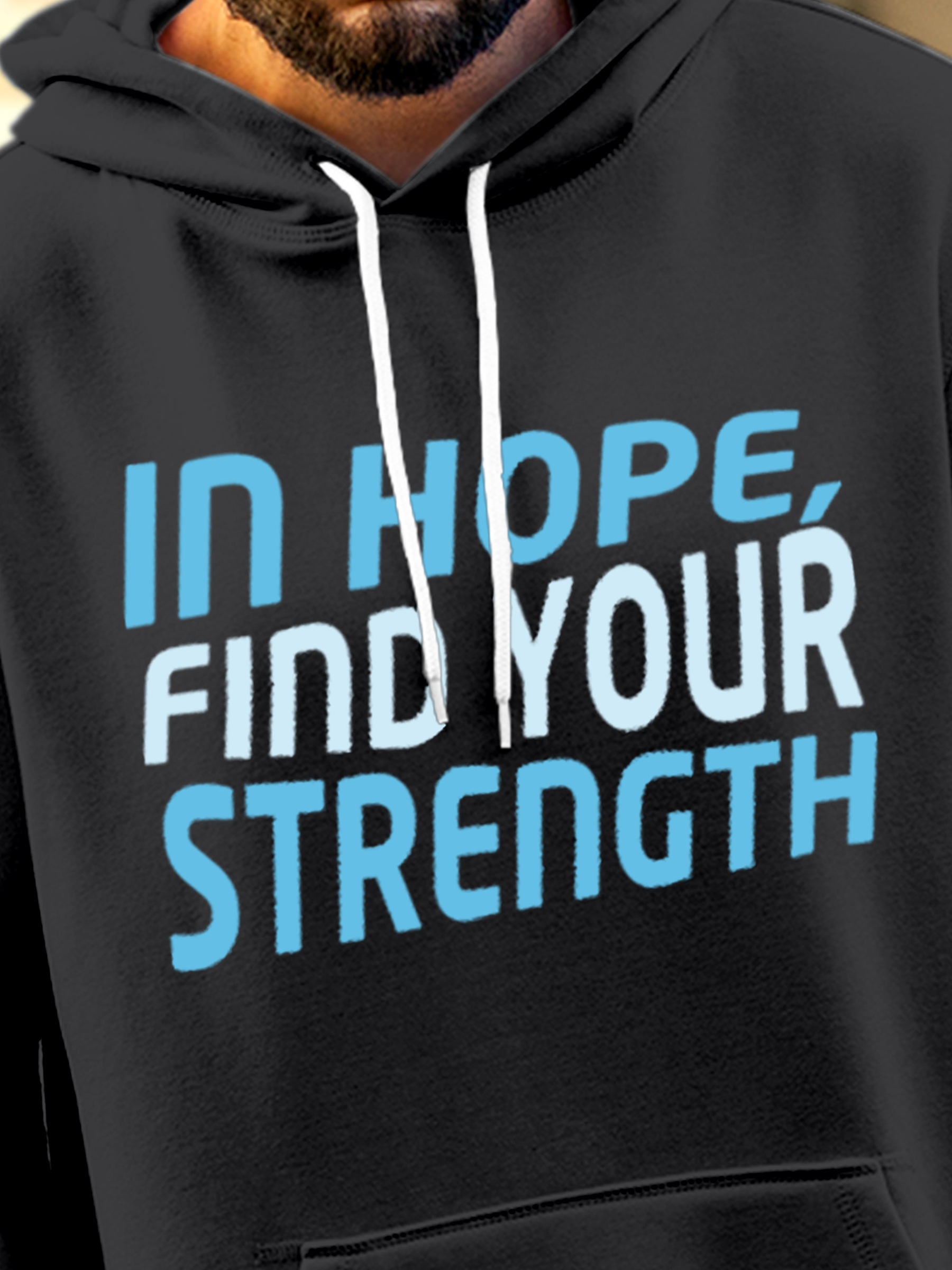 Close up of 'In Hope, Find Your Strength' design on Men's Charcoal Grey Hoodie Sweatshirt, highlighting intricate details and vibrant print.