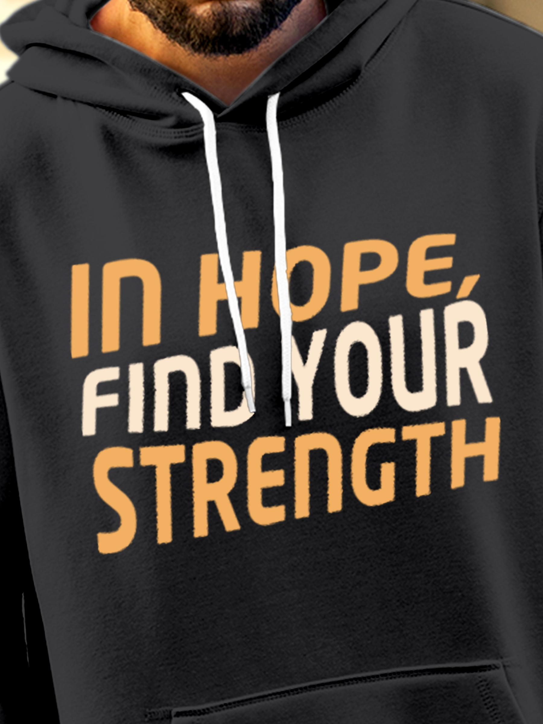 Close up of 'In Hope, Find Your Strength' design on Men's Charcoal Grey Hoodie Sweatshirt, highlighting intricate details and vibrant print.
