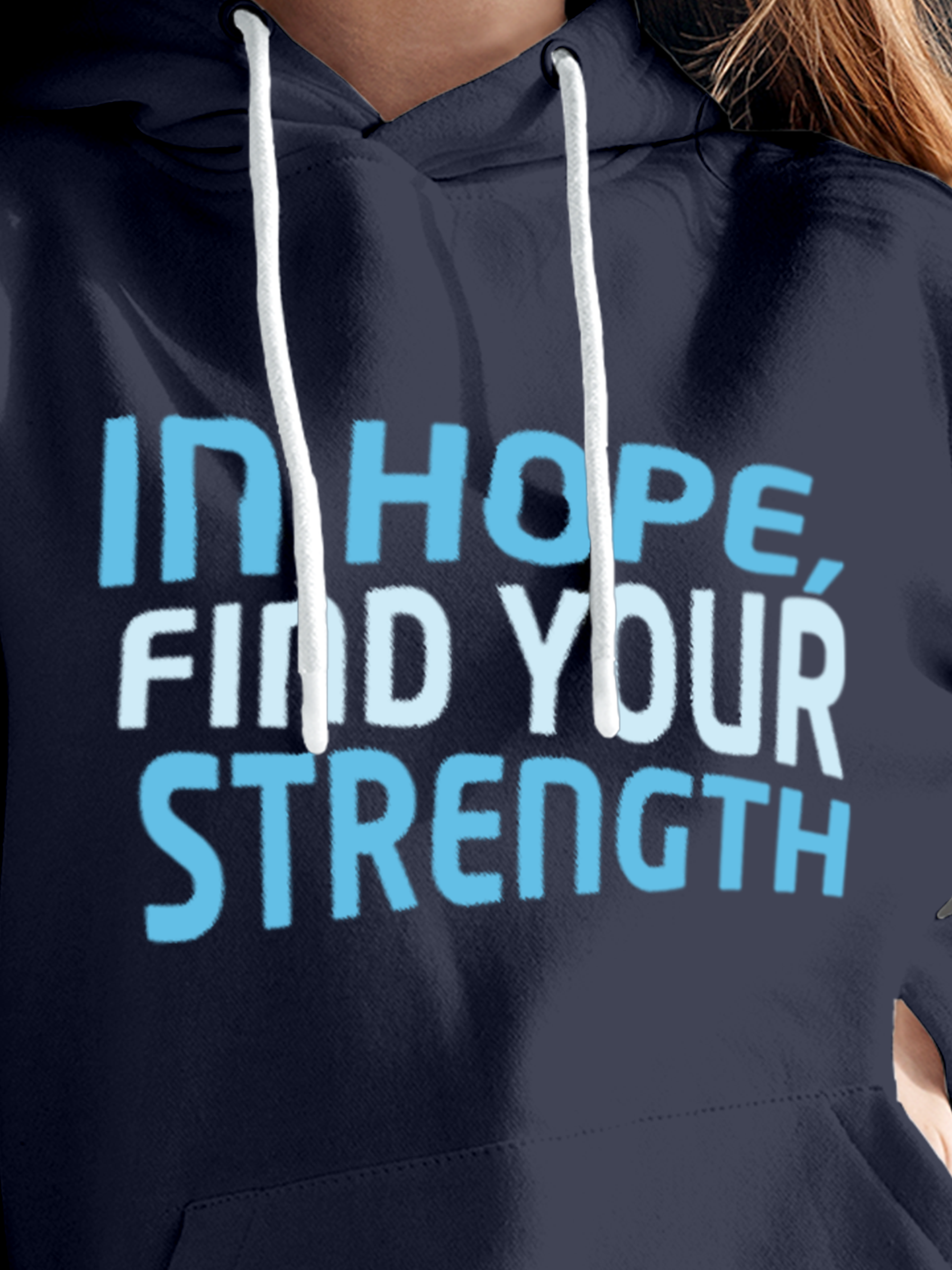 Close up of 'In Hope, Find Your Strength' design on Women's Navy Blue Hoodie Sweatshirt, highlighting intricate details and vibrant print.