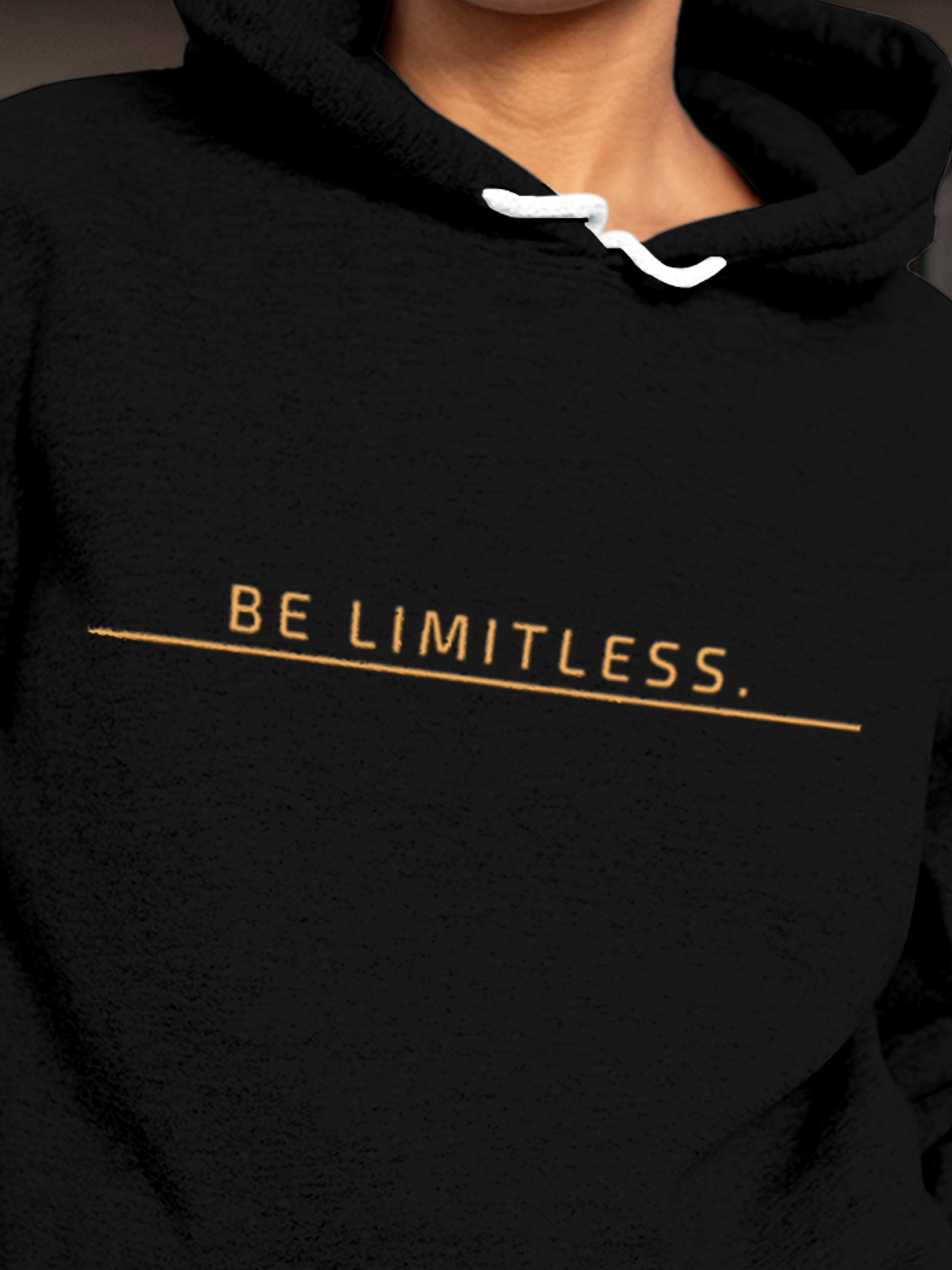 Close up of 'Be Limitless' design on Women's Black Hoodie Sweatshirt, highlighting intricate details and vibrant print.