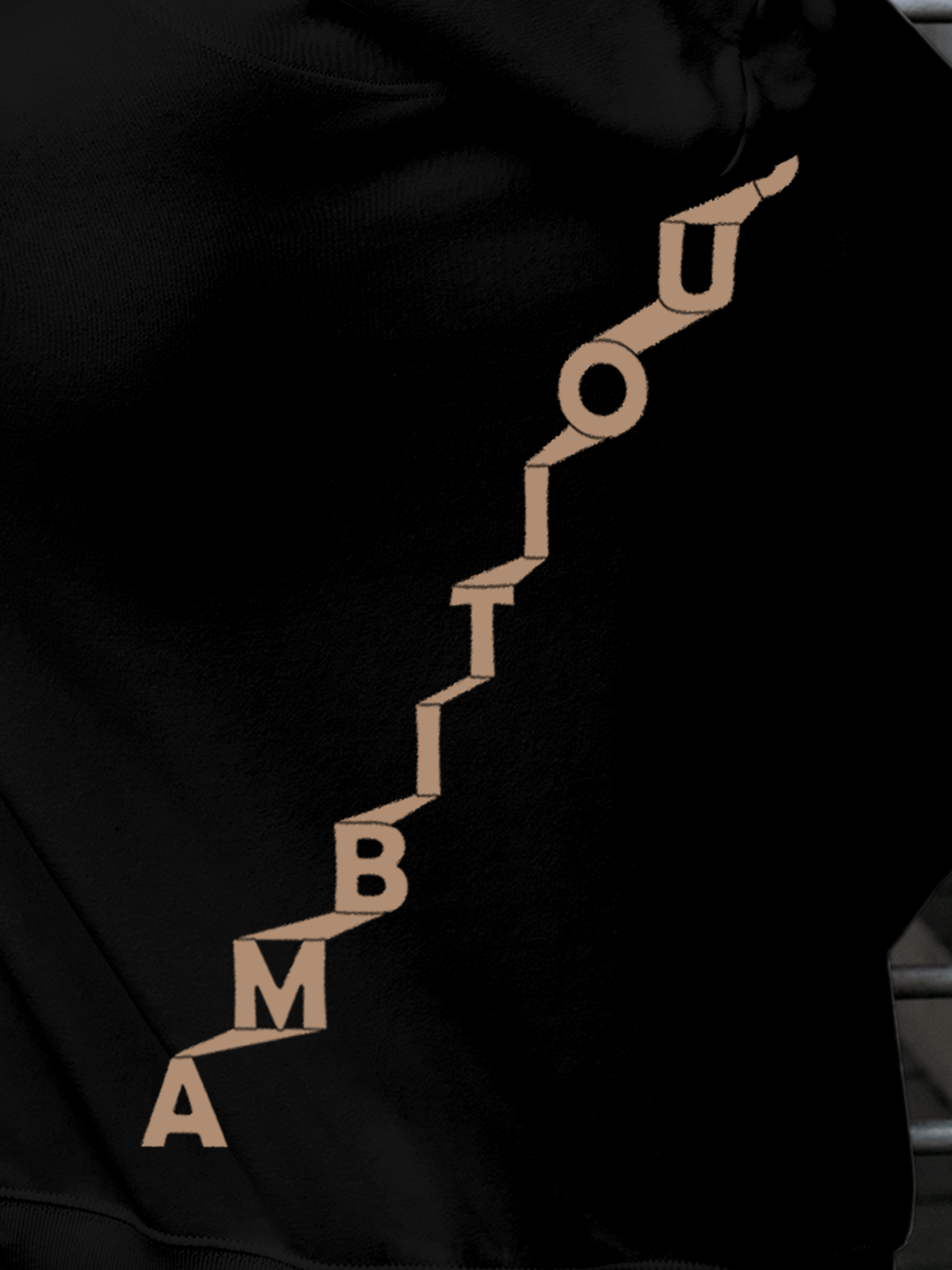 Close up of 'Ambitious' design on Men's Black Hoodie Sweatshirt, highlighting intricate details and vibrant print.