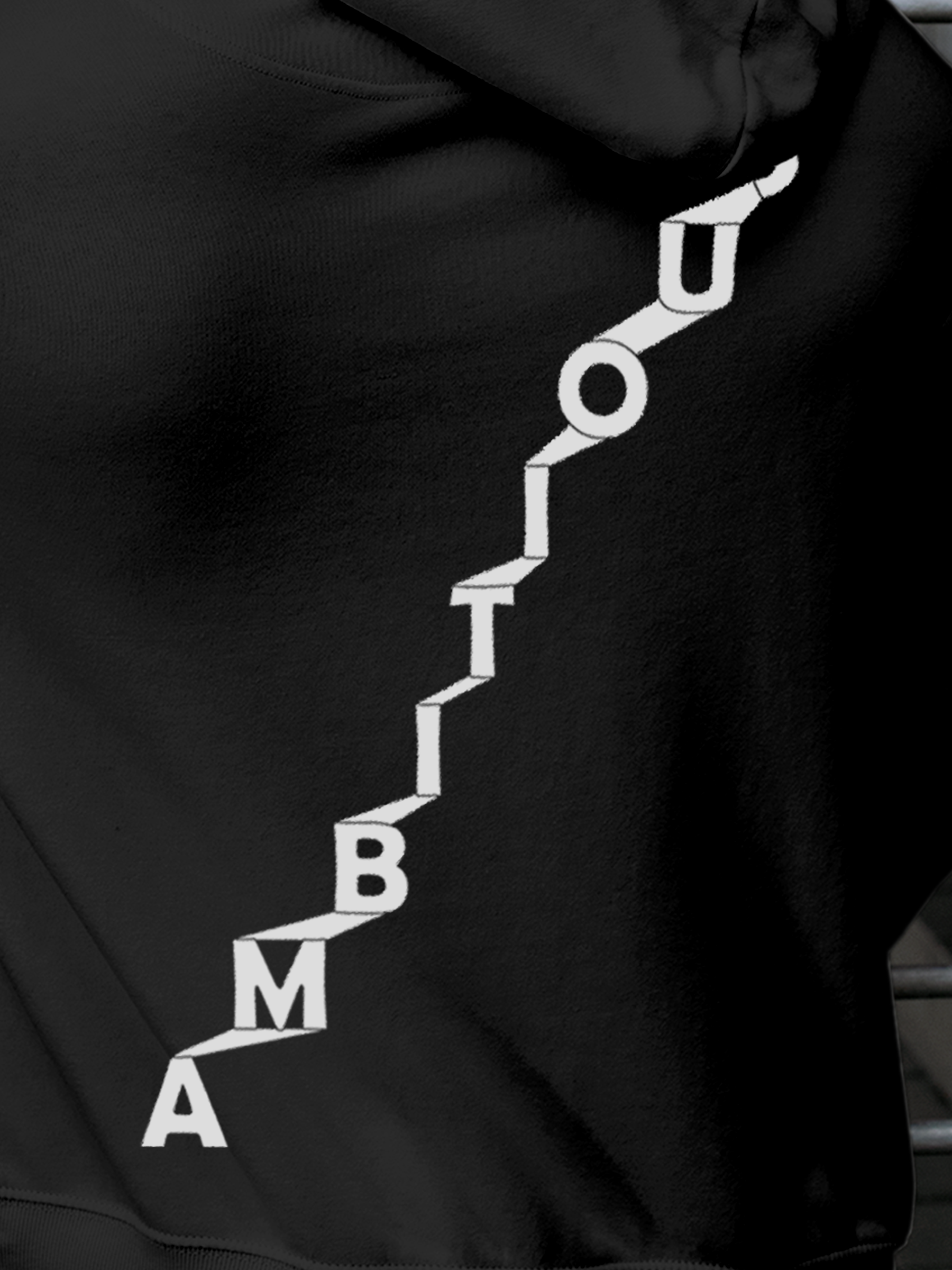 Close up of 'Ambitious' design on Men's Charcoal Grey Hoodie Sweatshirt, highlighting intricate details and vibrant print.