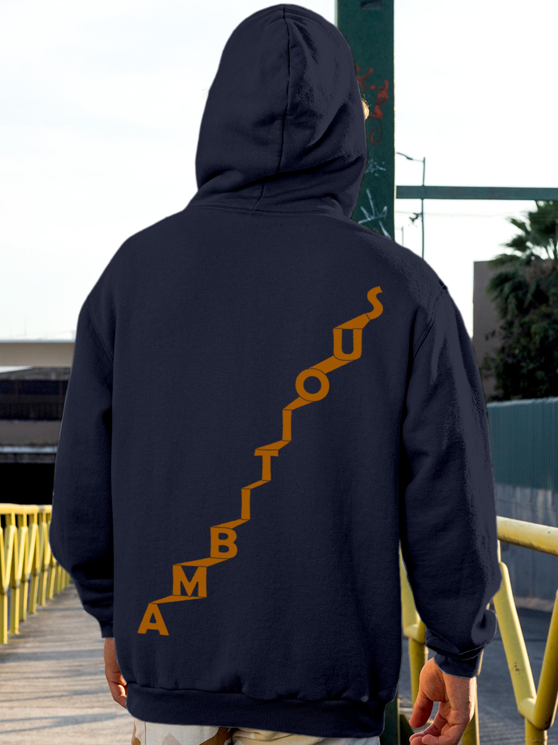 Model wearing Men's Navy Blue Hoodie Sweatshirt with 'Ambitious' design, offering effortless style and premium comfort