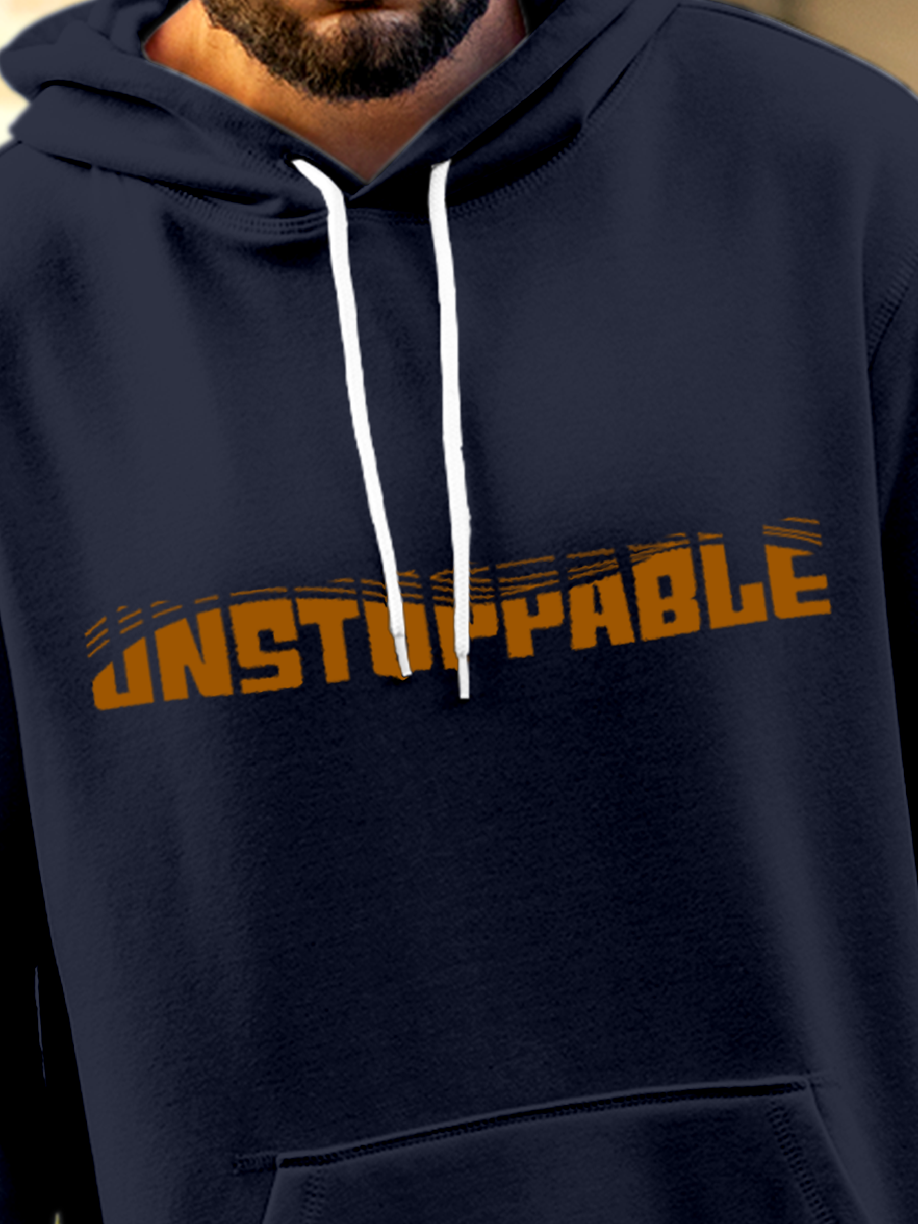 Close up of 'Unstoppable' design on Men's Navy Blue Hoodie Sweatshirt, highlighting intricate details and vibrant print.