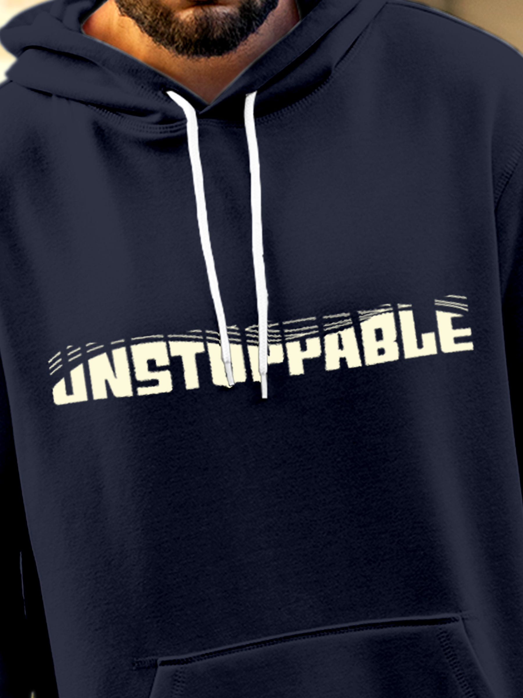 Close up of 'Unstoppable' design on Men's Navy Blue Hoodie Sweatshirt, highlighting intricate details and vibrant print.
