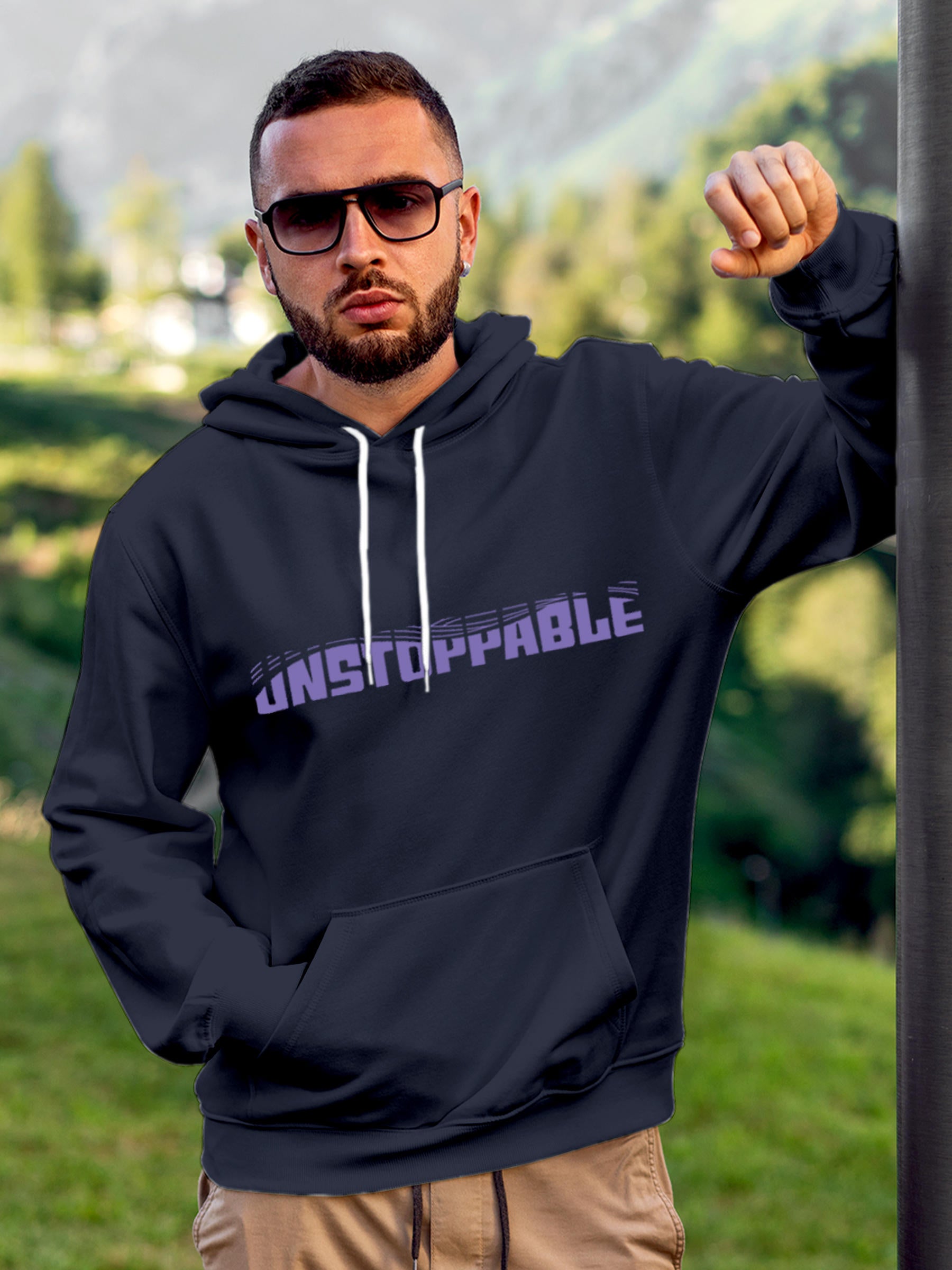 Model wearing Men's Navy Blue Hoodie Sweatshirt with 'Unstoppable' design, offering effortless style and premium comfort