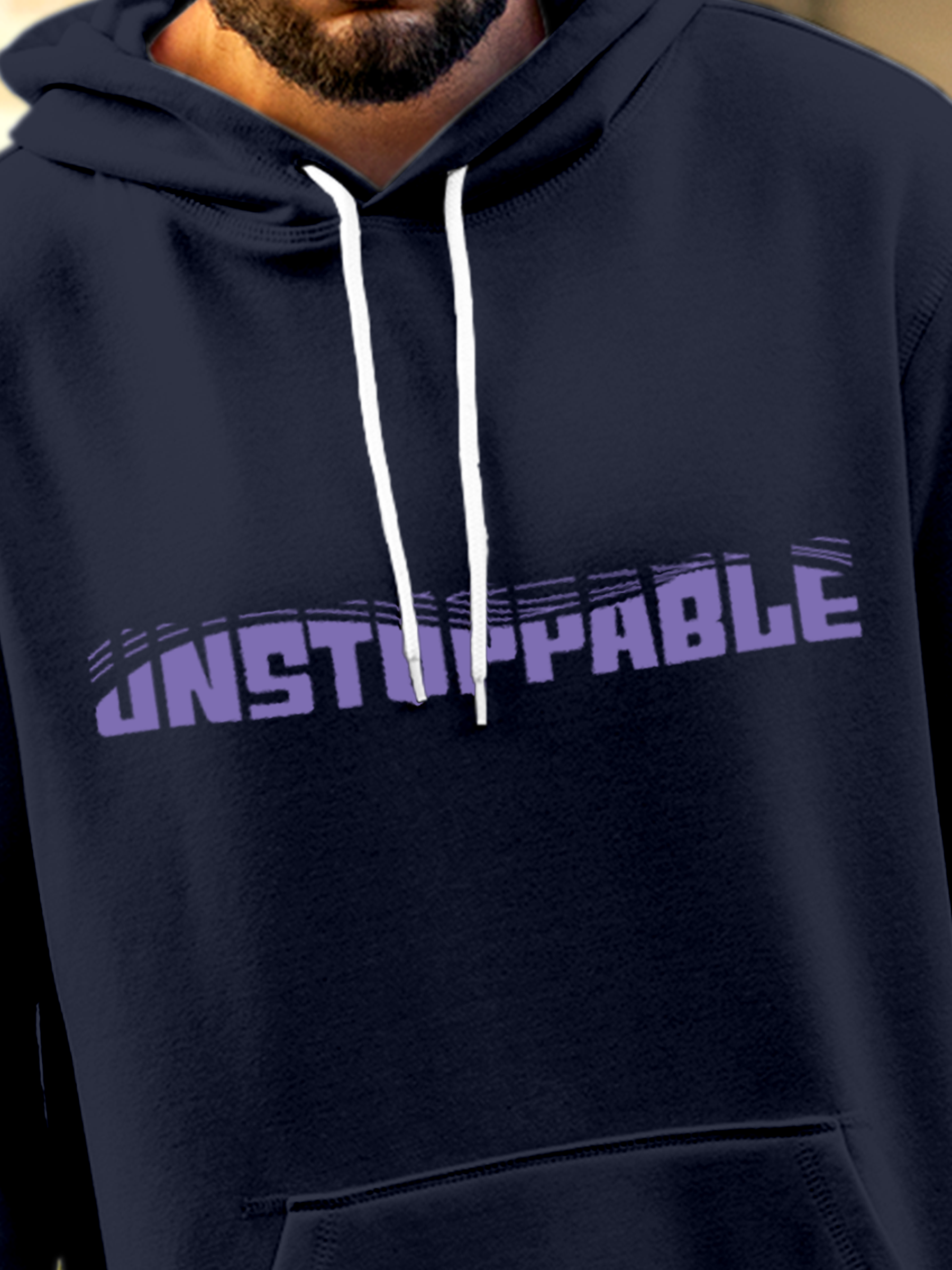 Close up of 'Unstoppable' design on Men's Navy Blue Hoodie Sweatshirt, highlighting intricate details and vibrant print.