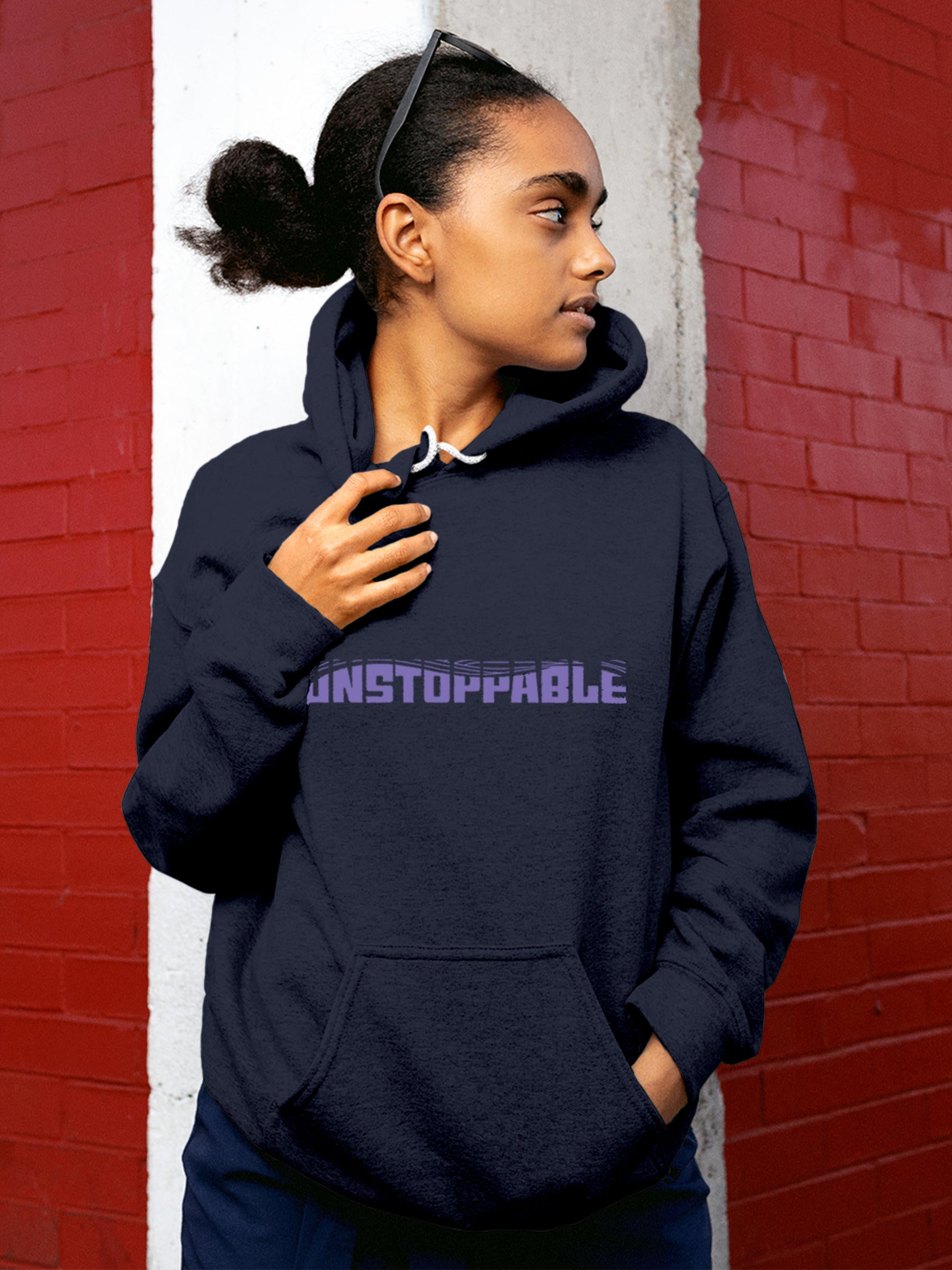 Model wearing Women's Navy Blue Hoodie Sweatshirt with 'Unstoppable' design, offering effortless style and premium comfort