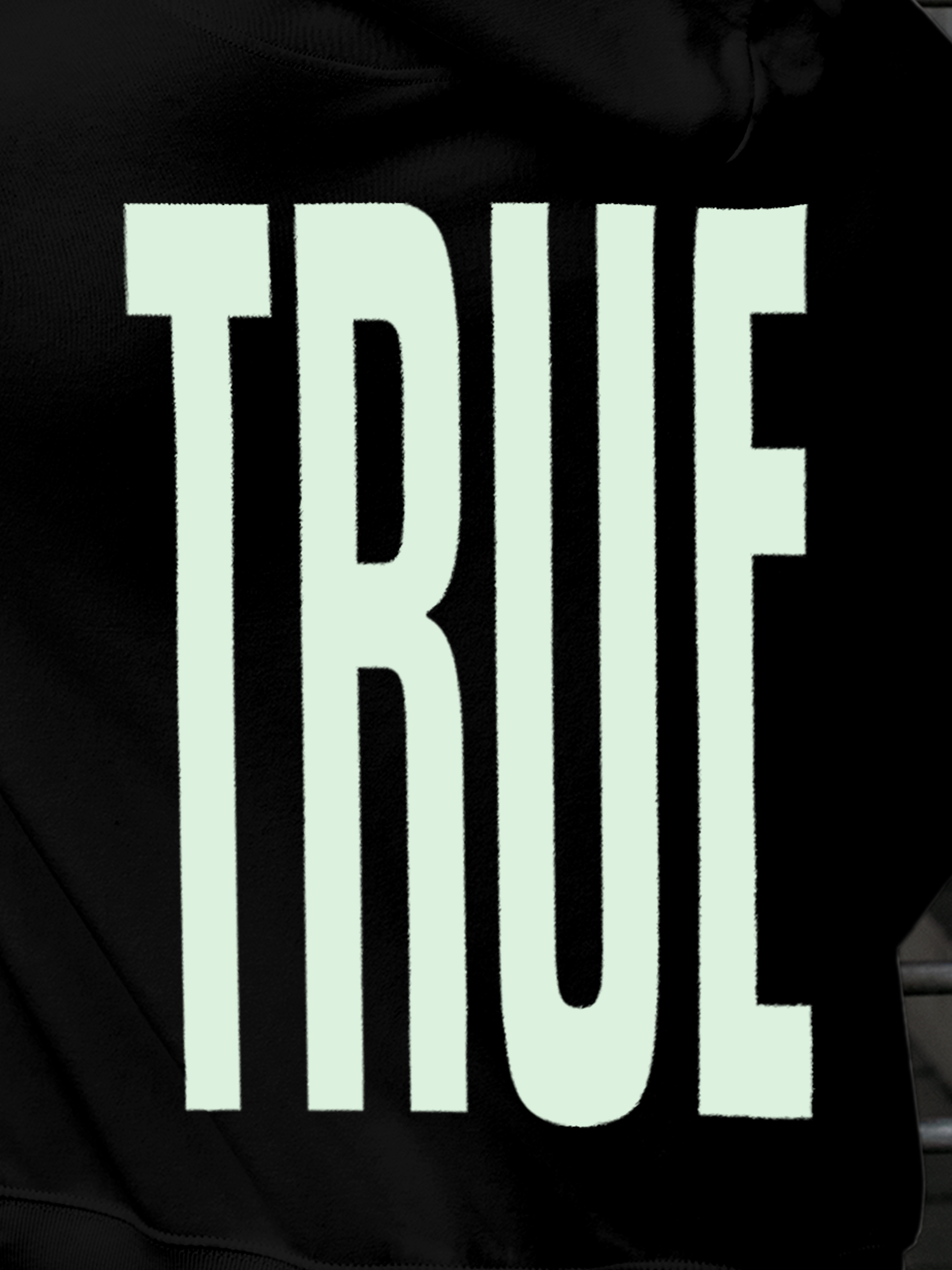 Close up of 'Truth' design on Men's Black Hoodie Sweatshirt, highlighting intricate details and vibrant print.