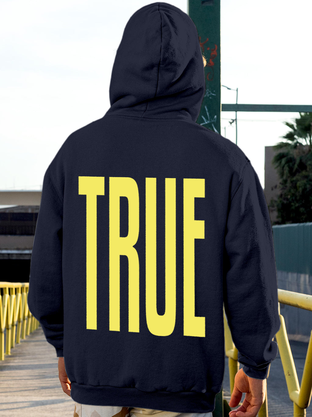 Model wearing Men's Navy Blue Hoodie Sweatshirt with 'Truth' design, offering effortless style and premium comfort