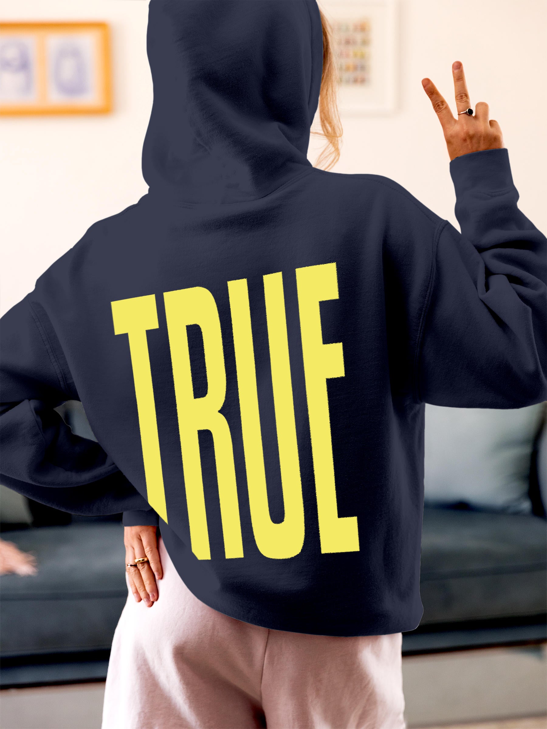 Model wearing Women's Navy Blue Hoodie Sweatshirt with 'Truth' design, offering effortless style and premium comfort