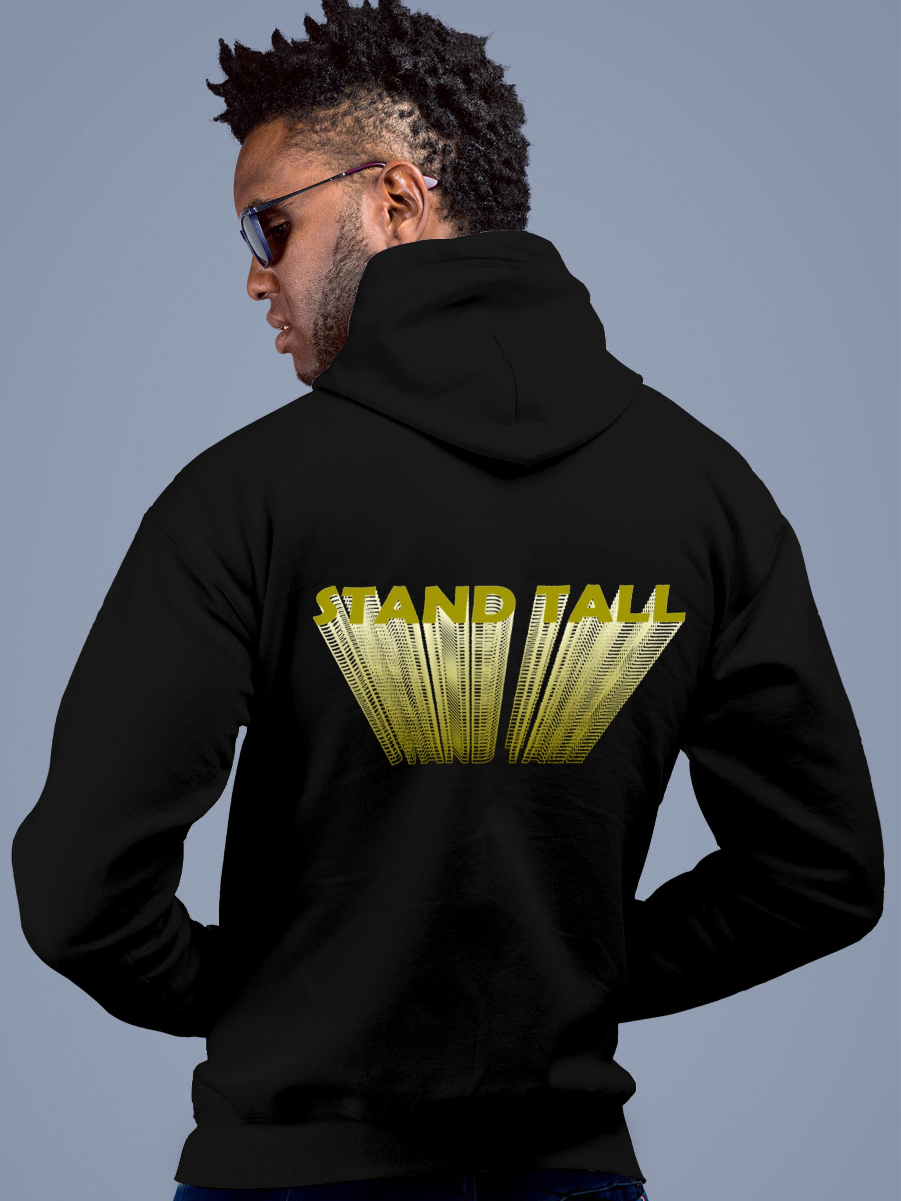 Model wearing Men's Black Hoodie Sweatshirt with 'Stand Tall' design, offering effortless style and premium comfort