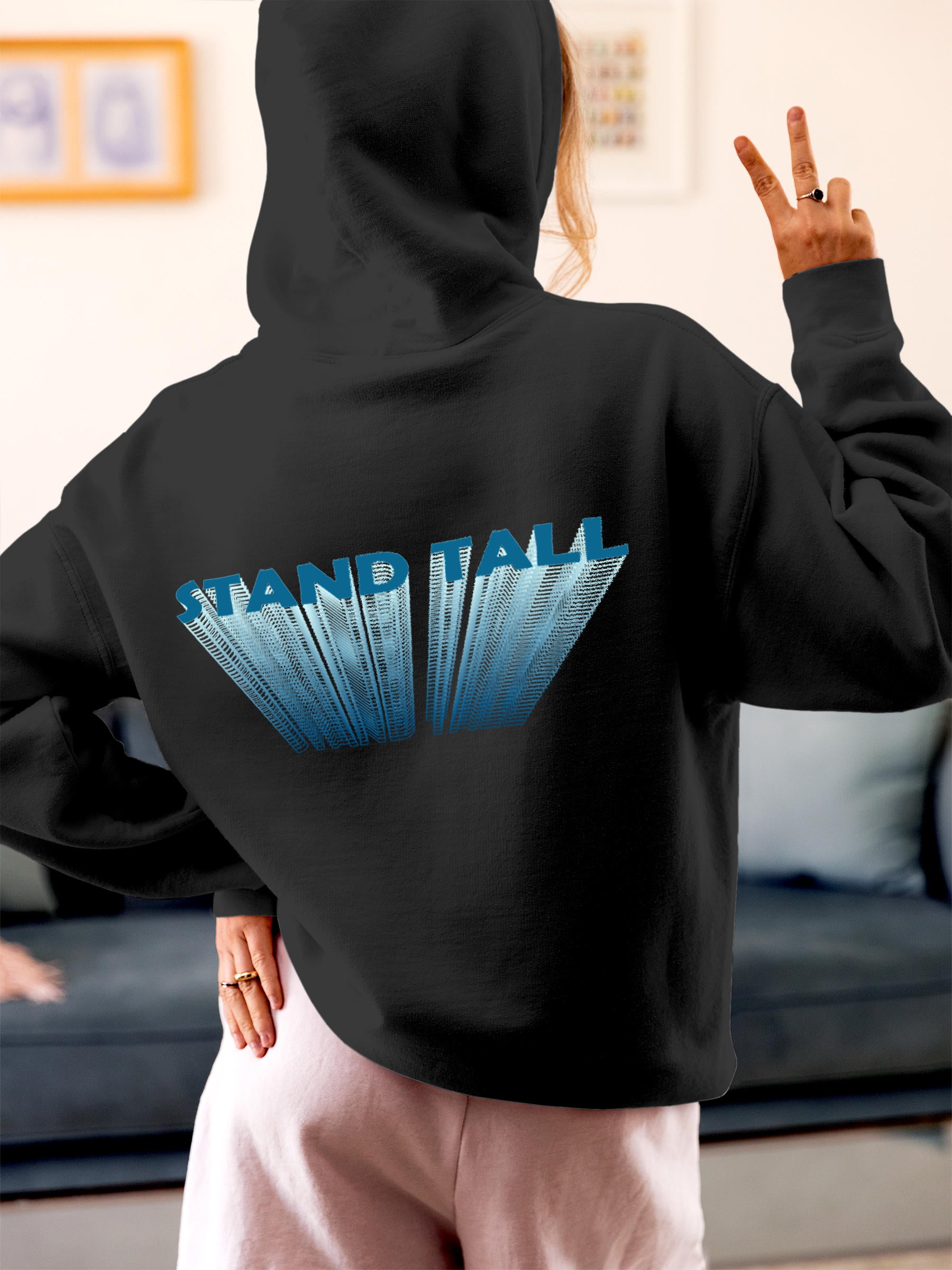 Model wearing Women's Dark Grey Hoodie Sweatshirt with 'Stand Tall' design, offering effortless style and premium comfort