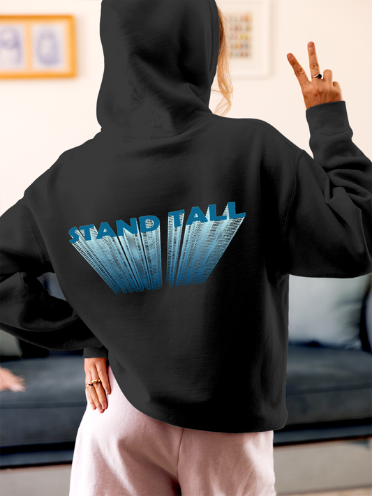 Fighterhero Hoodie Collection: Model wearing Women's Charcoal Grey Hoodie Sweatshirt with 'Stand Tall' design