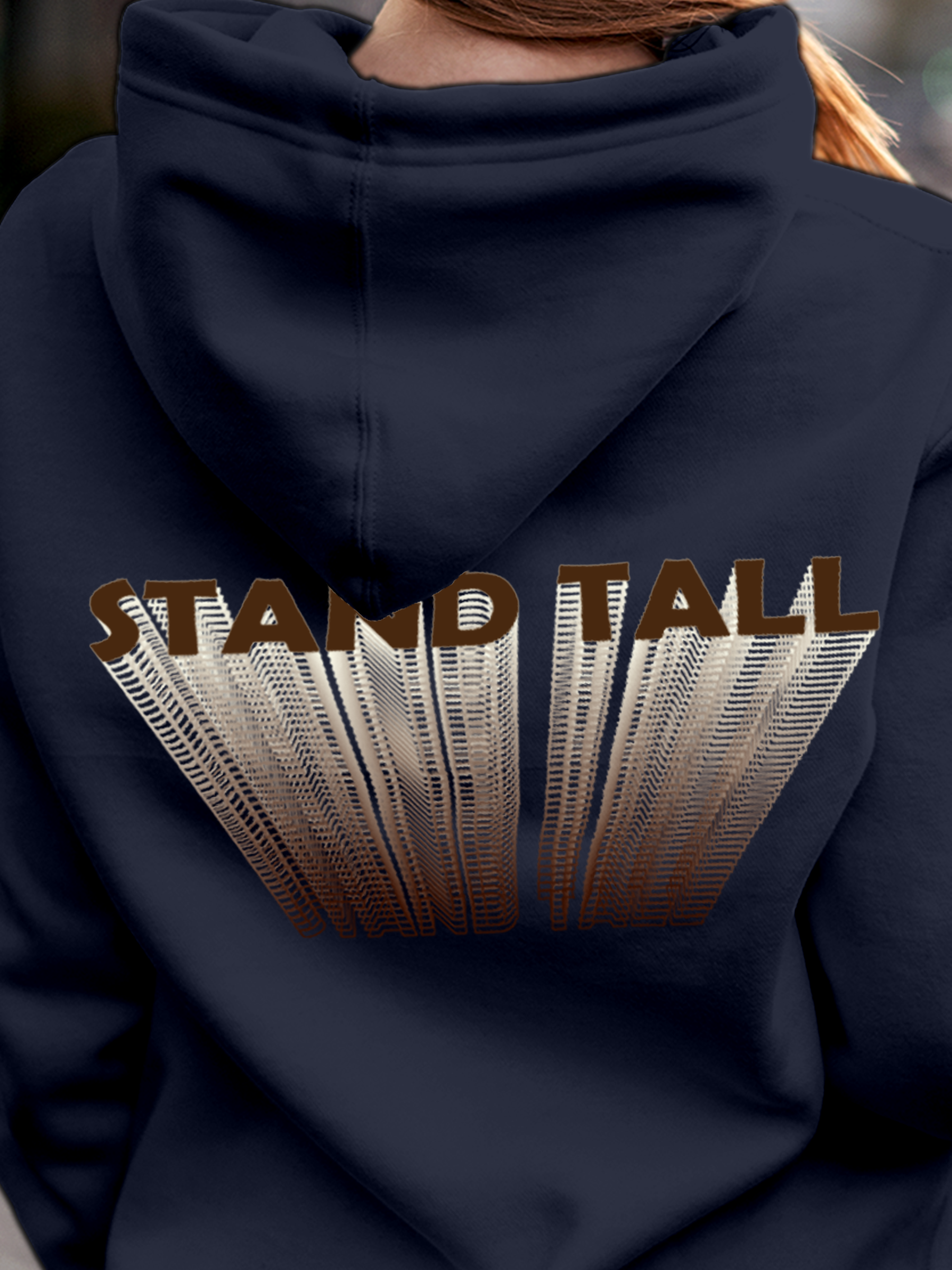 Close up of 'Stand Tall' design on Women's Navy Blue Hoodie Sweatshirt, highlighting intricate details and vibrant print.