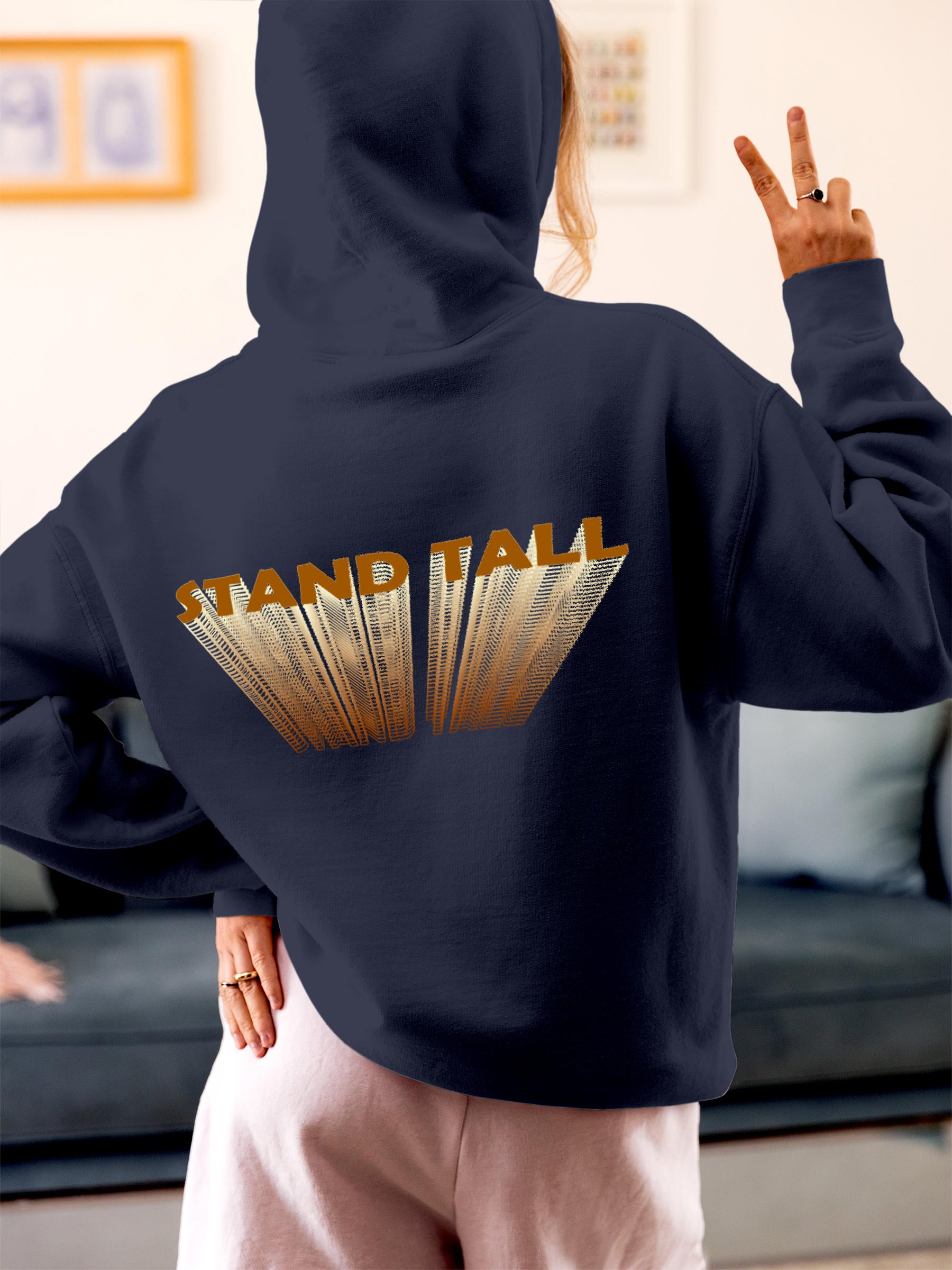 Model wearing Women's Navy Blue Hoodie Sweatshirt with 'Stand Tall' design, offering effortless style and premium comfort